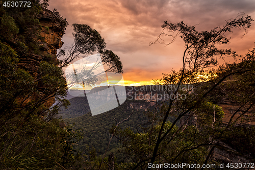 Image of Sunset over the cliffs and valleys of Blue Mountains