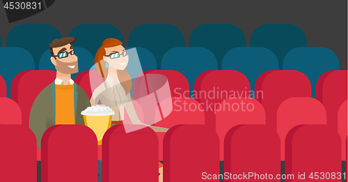 Image of Caucasian couple watching 3D movie in the theatre.