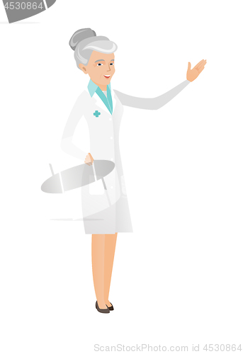 Image of Senior caucasian doctor with outstretched hand.