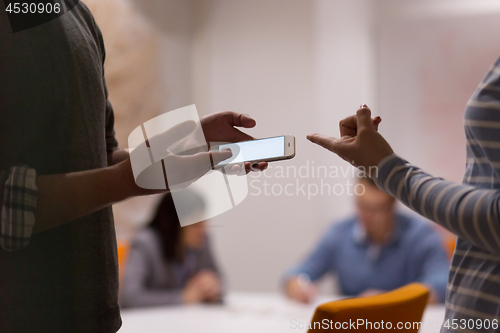 Image of Business Team At A Meeting at modern office building