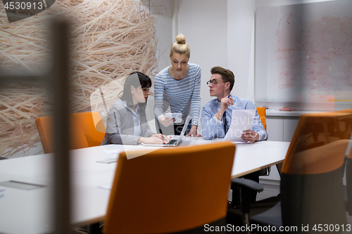 Image of Business Team At A Meeting at modern office building