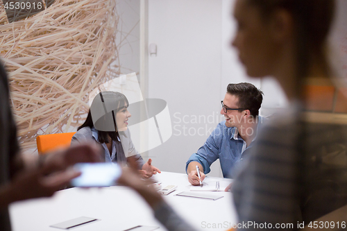 Image of Business Team At A Meeting at modern office building