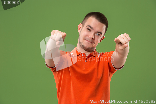 Image of The happy business man point you and want you, half length closeup portrait