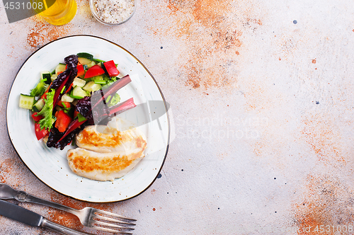 Image of chicken and salad