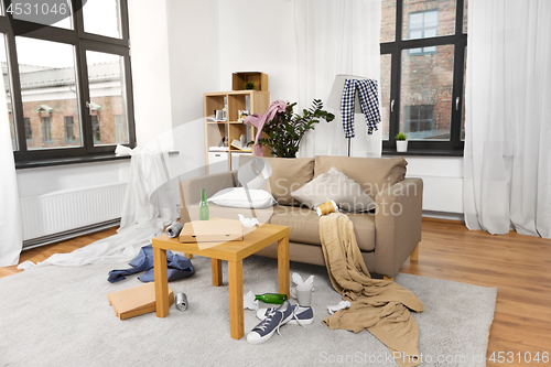 Image of interior of messy home room with scattered stuff