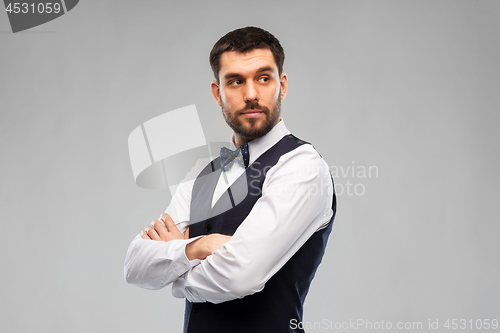 Image of man in party clothes and bowtie