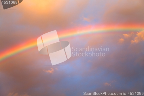 Image of Rainbow agains cloudy sky