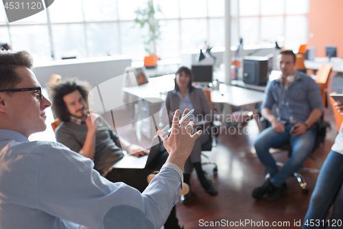 Image of Young Business Team At A Meeting at modern office building