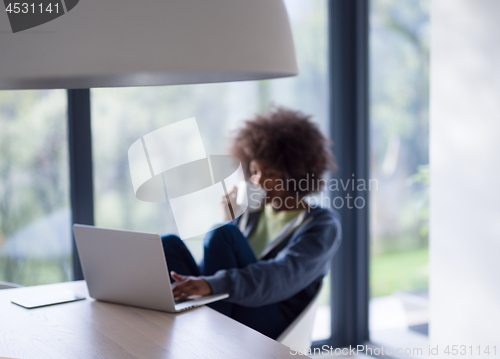 Image of African American woman in the living room