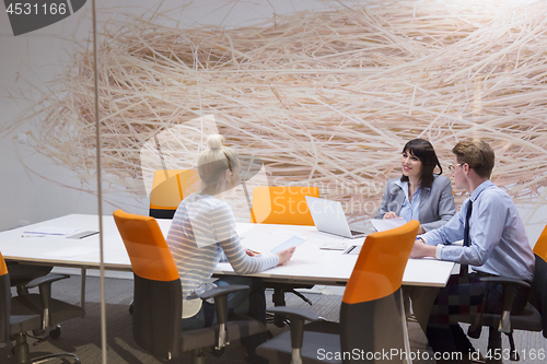 Image of Business Team At A Meeting at modern office building