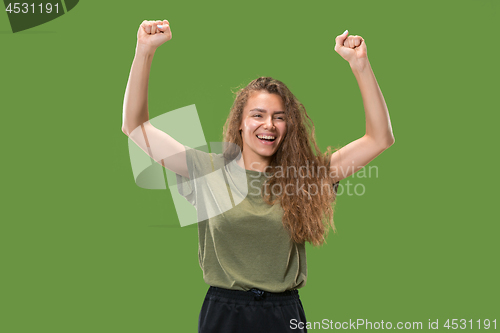 Image of Winning success woman happy ecstatic celebrating being a winner. Dynamic energetic image of female model