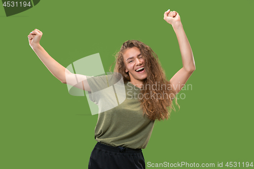 Image of Winning success woman happy ecstatic celebrating being a winner. Dynamic energetic image of female model