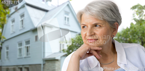 Image of portrait of pensive senior woman
