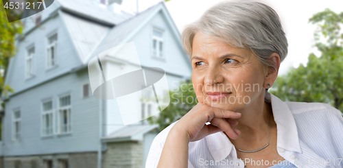 Image of portrait of pensive senior woman