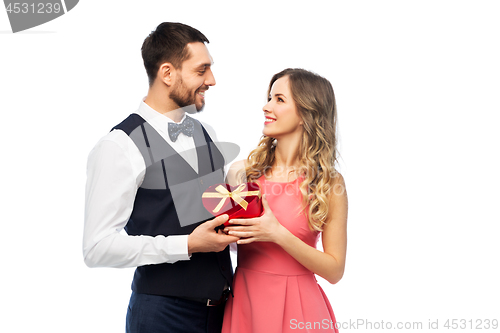 Image of happy couple with gift on valentines day