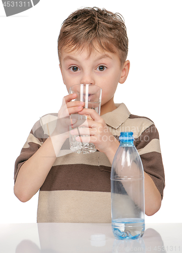 Image of Little boy with bottle of water