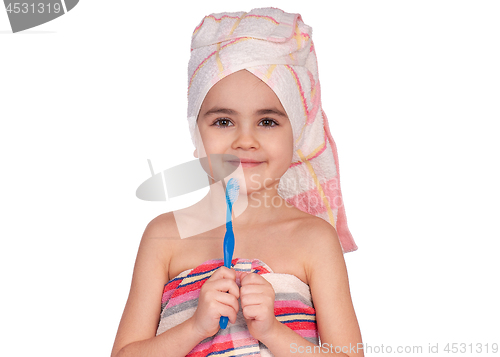 Image of Little girl brushing teeth