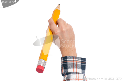 Image of Hand with big pencil