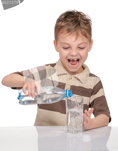 Image of Little boy with bottle of water