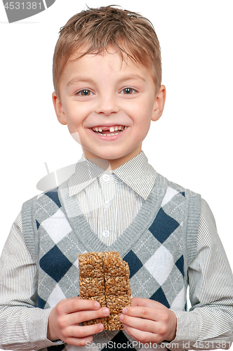 Image of Little boy eating Kozinaki