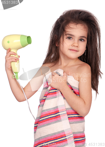 Image of Little girl with hair dryer