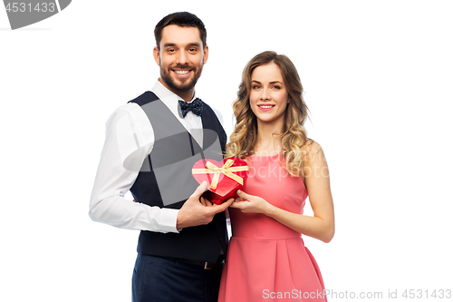 Image of happy couple with gift on valentines day