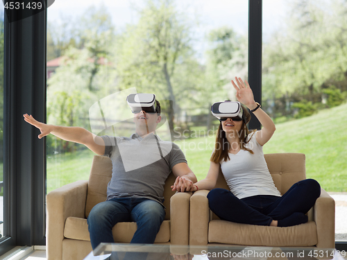 Image of Couple using virtual reality headset