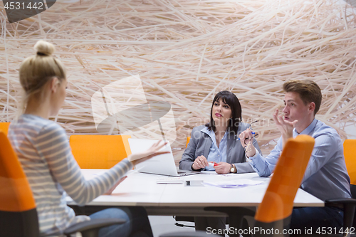 Image of Business Team At A Meeting at modern office building