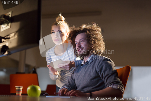 Image of young designers in the night office