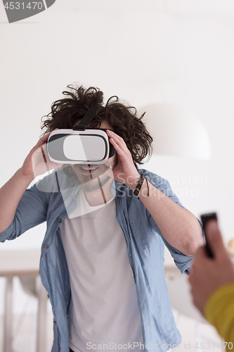 Image of man using VR-headset glasses of virtual reality