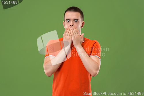 Image of The young attractive man looking suprised