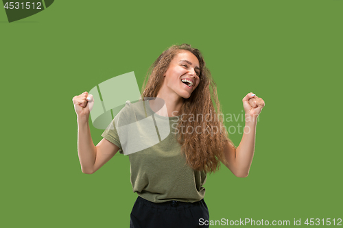 Image of Winning success woman happy ecstatic celebrating being a winner. Dynamic energetic image of female model