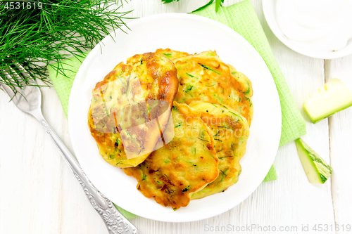 Image of Pancakes of zucchini on board top