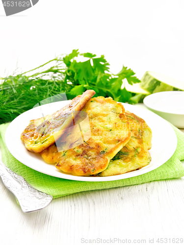 Image of Pancakes of zucchini on light board