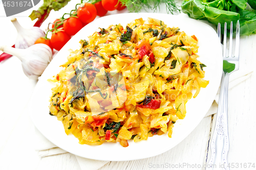 Image of Cabbage stew with chard in plate on white board