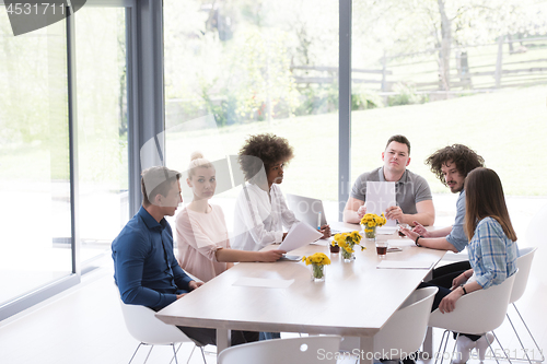 Image of Multiethnic startup business team on meeting