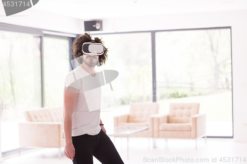 Image of man using VR-headset glasses of virtual reality