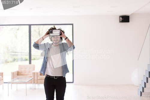 Image of man using VR-headset glasses of virtual reality