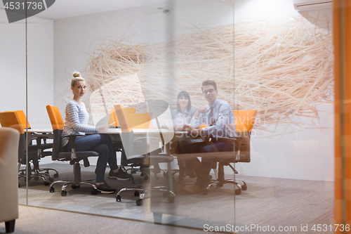 Image of Business Team At A Meeting at modern office building