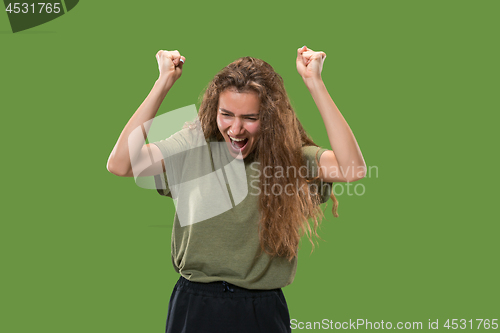 Image of Winning success woman happy ecstatic celebrating being a winner. Dynamic energetic image of female model