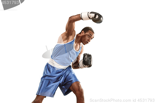 Image of Sporty man during boxing exercise. Photo of boxer on white background