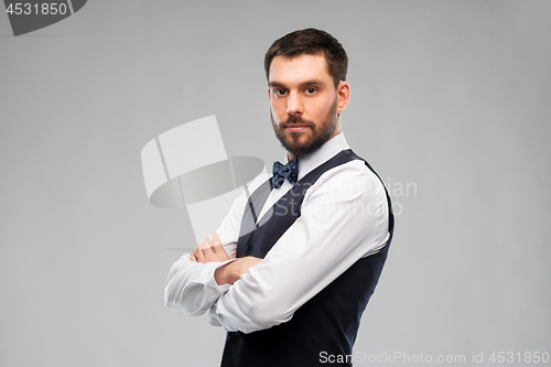 Image of man in party clothes and bowtie