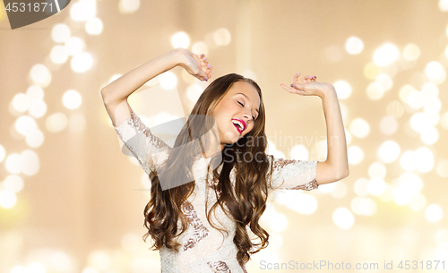 Image of happy young woman or teen girl in fancy dress