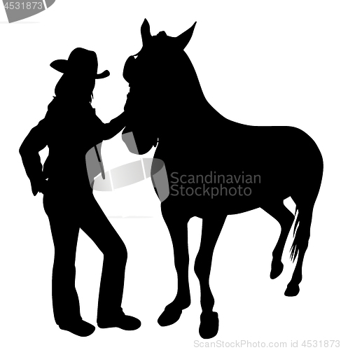 Image of Cowgirl standing with horse