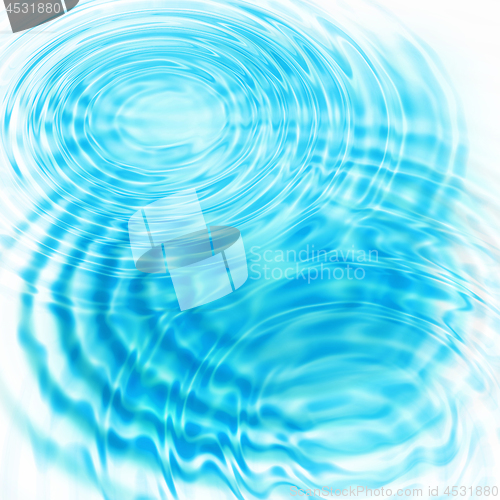 Image of Abstract blue circular water ripples