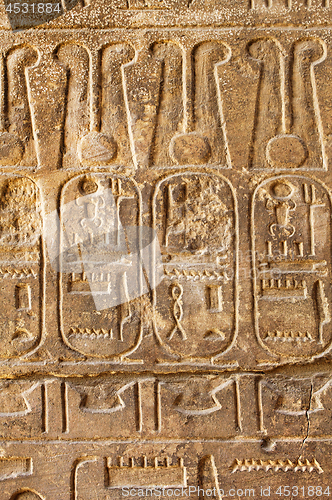 Image of Ancient stone wall with Egyptian hieroglyphs