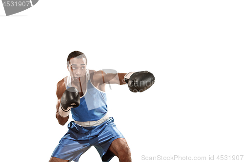 Image of Sporty man during boxing exercise. Photo of boxer on white background