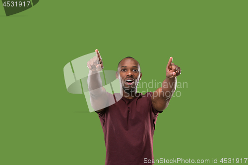 Image of Winning success man happy ecstatic celebrating being a winner. Dynamic energetic image of male model