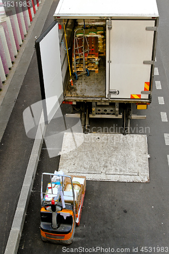 Image of Forklift and Truck