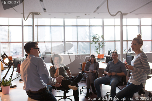 Image of Young Business Team At A Meeting at modern office building